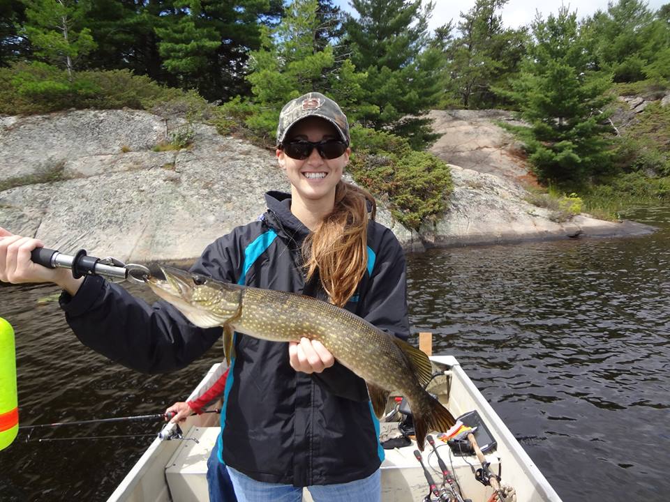 Girl holding a French River Delta Pike