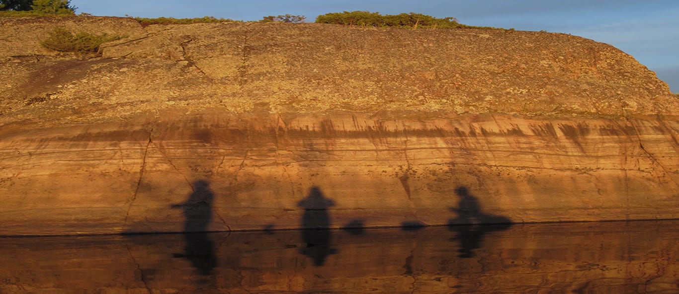 3 Fishermen's Shadows on the Canadian Shield in the French River Provincial Park, Northeastern Canada