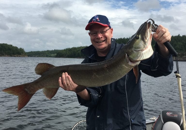 George Taylor with a Fall French River Muskie.