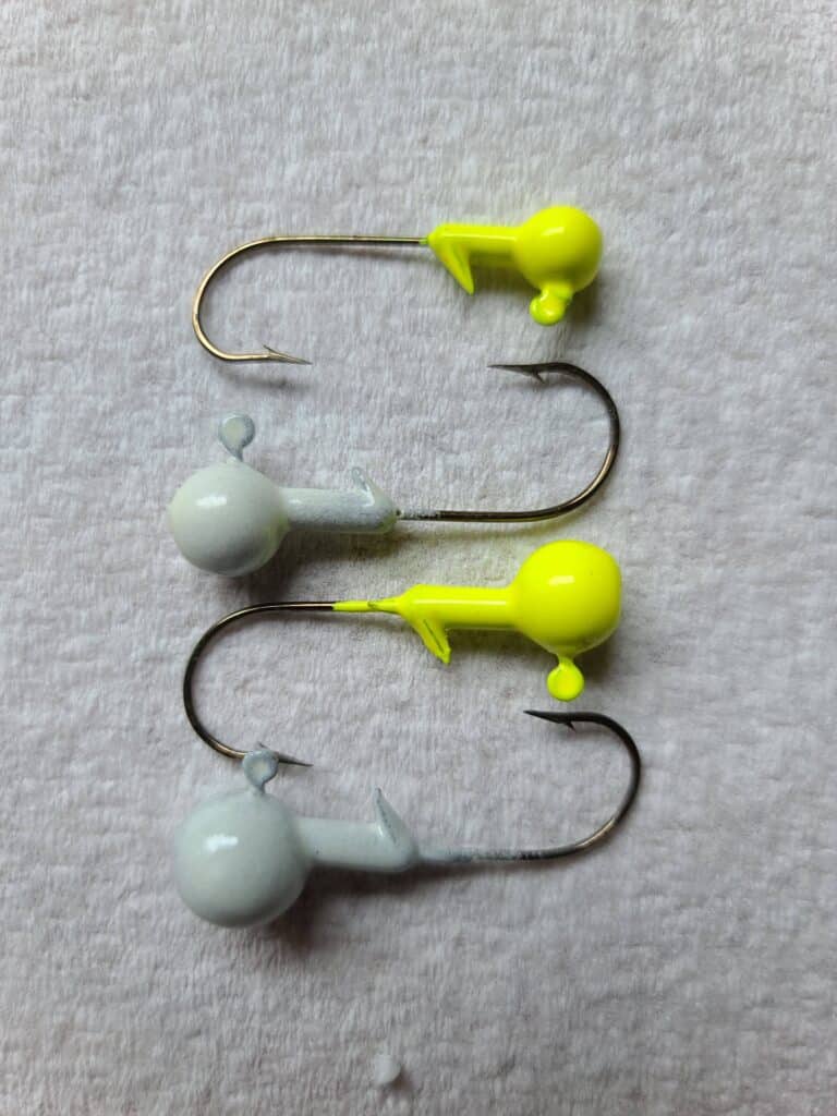 assortment of small and medium lead jig heads often used for walleye fishing in the French River, Ontario Canada